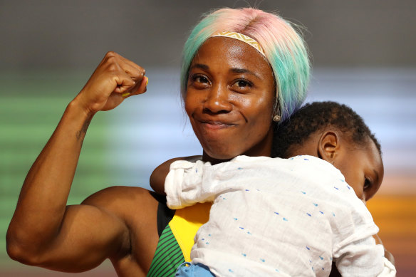 Shelly-Ann Fraser-Pryce of Jamaica celebrates with her son Zyon after winning the Women’s 100 Metres final at the World Athletics Championships Doha in 2019.