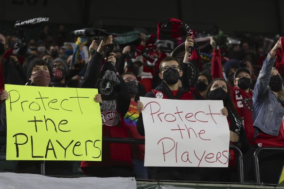 Fans in the stand at the same NWSL match, which came after two players blew the whistle on years of alleged harassment.