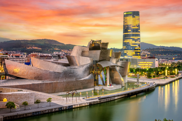 Bilbao’s Guggenheim Museum and Iberdrola Tower at sunset.