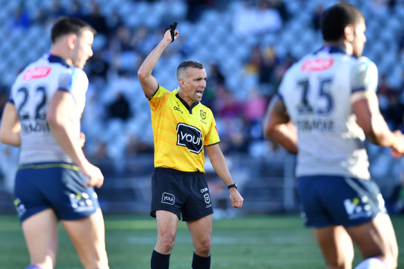 Referee Matt Cecchin signals six-again during a Storm-Warriors clash earlier this season.