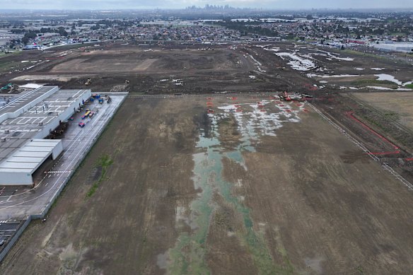 The vast former site of the Ford factory site, now destined to be the home for a new data centre. The Upfield railway line runs to the right of the site in this picture, and Sydney Road is on the left. In the distance is Melbourne’s city centre.