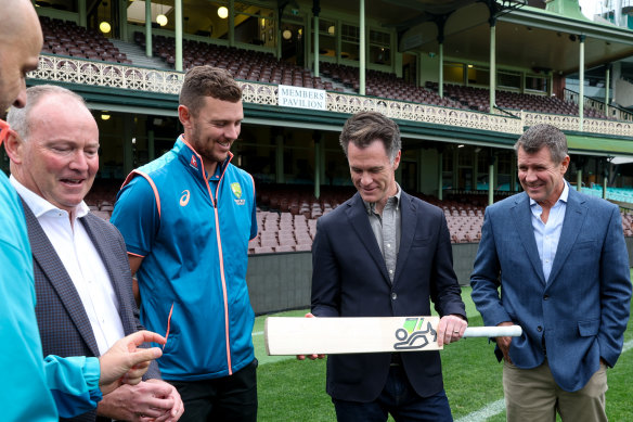 Mike Baird with NSW Premier Chris Minns, Josh Hazlewood, Nathan Lyon and Cricket NSW CEO Lee Germon.