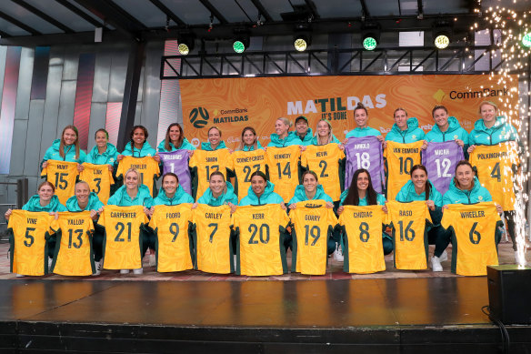 The Matildas pose with their World Cup jerseys at Federation Square.