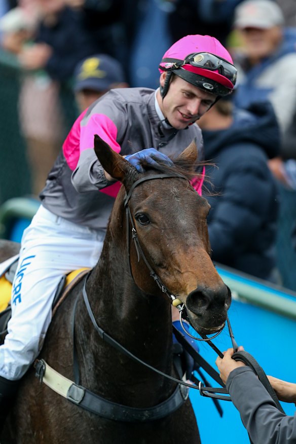 Clayton Douglas celebrates on Gold Medals.
