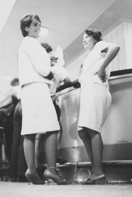 Shackled: Merle Thornton and Rosalie Bognor are chained to the bar at the Regatta Hotel, Brisbane, on 31st March 1965, in a protest for women’s rights. They chained themselves to the bar after being refused a drink.