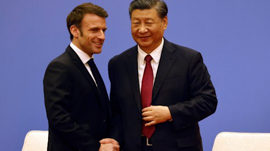 French President Emmanuel Macron and Chinese President Xi Jinping meet in Beijing.