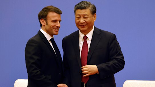 French President Emmanuel Macron and Chinese President Xi Jinping meet in Beijing.