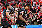 A packed Suncorp Stadium watches the Dolphins.