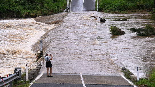 The Coomera River cuts off Clagiraba Road on the Gold Coast.