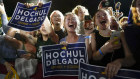 Supporters of President Joe Biden cheer during a campaign rally for New York Governor Kathy Hochul.