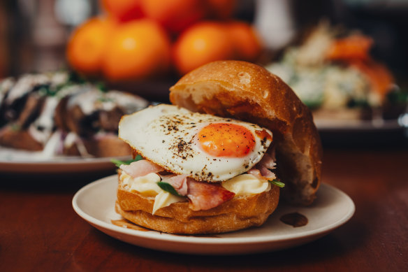 Bacon and egg roll with spinach.