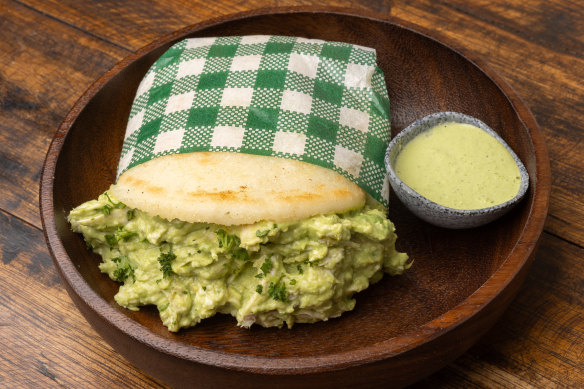 The reina pepiada, aka the “curvy queen” arepa with chicken and avocado.