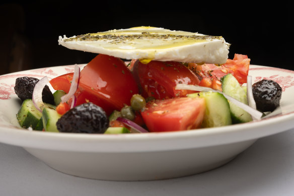 Greek village salad is made with big hunks of tomato and feta and crisp cucumber.