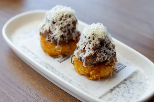 Hash browns provide the platform for Paroo kangaroo “cheeseburger” tartare.