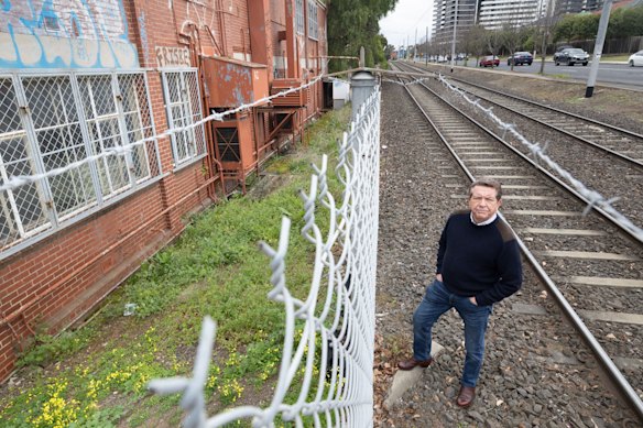 Former Maribyrnong mayor and long-time councillor Michael Clarke outside the disused Defence site.