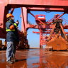 A ship unloader at Wu port of Taicang port unloading iron ore imported from Australia, Brazil and other countries. Prices for the metal have been sinking amid lower demand from China.