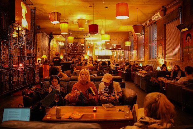 People reading books at a Book Doof in Melbourne