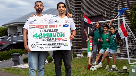 Brothers Ramy and Tony Segar with family members who were at Sydney Airport to welcome back head coach Graham Arnold after the Iraqi National Football qualification for the World Cup. 