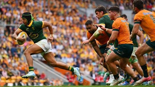 Kurt-Lee Arendse of the Springboks runs with the ball.