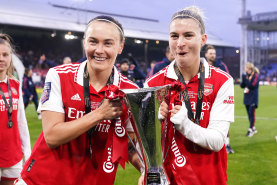 Caitlin Foord (left) and Steph Catley after their League Cup triumph with Arsenal in March.