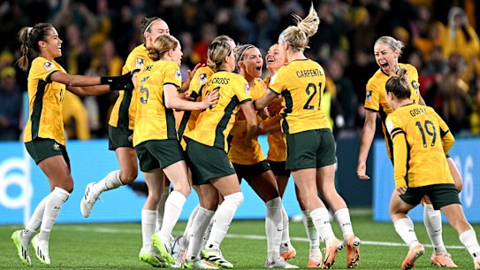 Australia celebrate at full-time.