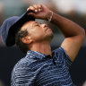 Woods struggles as McIlroy grabs first-round lead at PGA Championship
