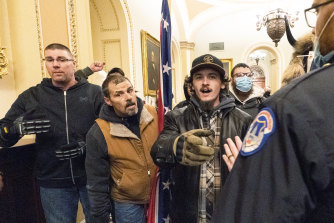 A year ago, Trump supporters roamed the hall after breaking through doors and windows to get inside the Capitol building. 
