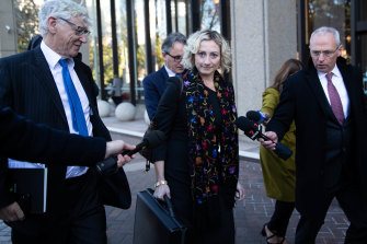One of Roberts-Smith’s lawyers, and friend, Monica Allen walking outside court with Seven’s commercial director, Bruce McWilliam (far left of image).