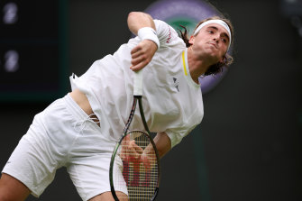 Stefanos Tsitsipas serves in his second-round win over Jordan Thompson at Wimbledon.