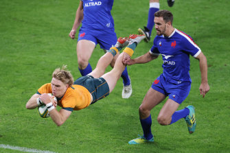 Wallabies halfback Tate McDermott crossing for a five-pointer against France in July 2021.