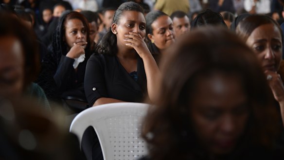 Mourners attend the memorial service for the Ethiopian Airlines air crew.