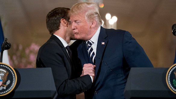 The pair had several handshakes including an awkward shake that turned into a hug.