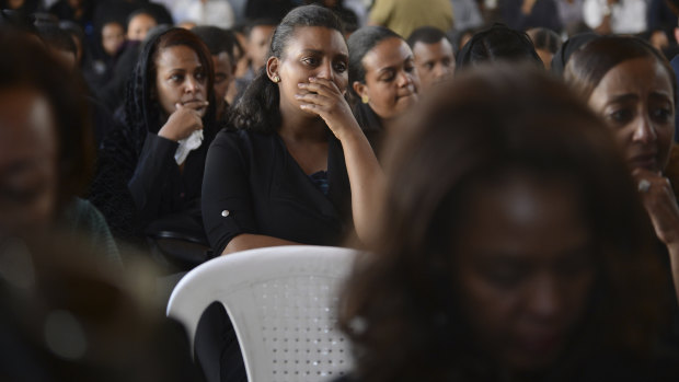 Mourners attend the memorial service for the Ethiopian Airlines air crew.