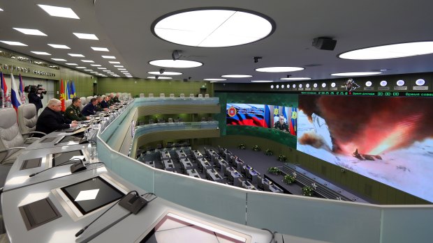 Top officials oversee the test launch of the Avangard hypersonic glide vehicle from the Defence Ministry's control room in Moscow.