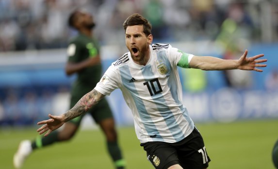 Lionel Messi scores for Argentina against Nigeria.