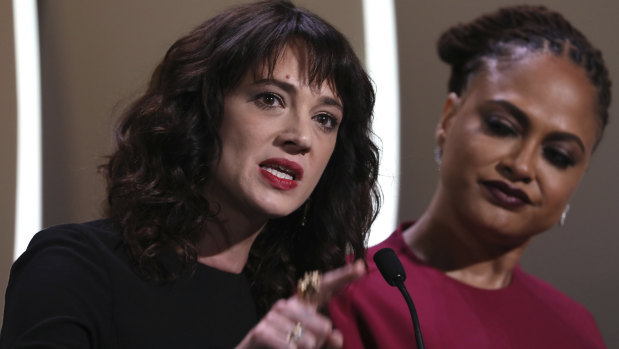 Argento speaks about being raped by Harvey Weinstein, with jury member Ava Duvernay, during the closing ceremony of Cannes in May.