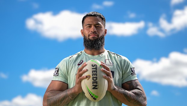 Payne Haas poses for a photo at Broncos training.