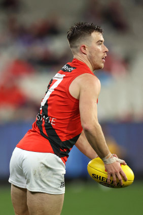 Zach Merrett gets a kick.