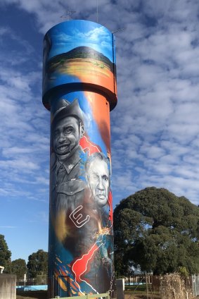 Captain Reg Saunders (left) on the water tower in Heywood, south-west Victoria.