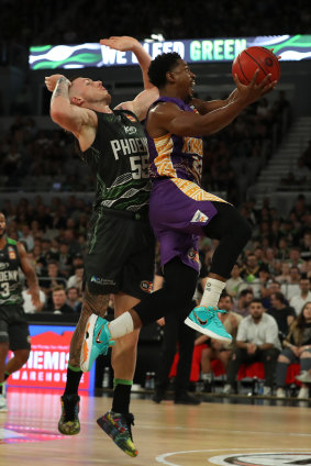 Kings star Casper Ware drives to the basket in their win over South East Melbourne Phoenix on Sunday.