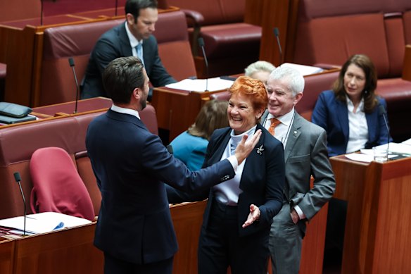 Senator Jonno Duniam is enbraced by One Nation leader Senator Pauline Hanson after he delivered his valedictory speech.