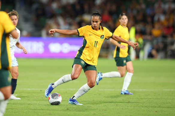 Mary Fowler takes control of the ball during the Olympic qualifier match between Australia and Chinese Taipei.