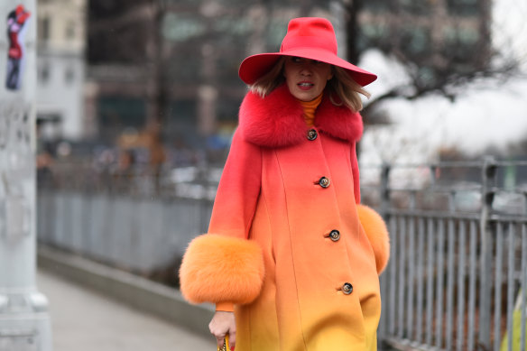 Denisa Palsha is pictured in New York wearing a coat by Saks Potts. The brand is bucking a trend by continuing its use of fur.