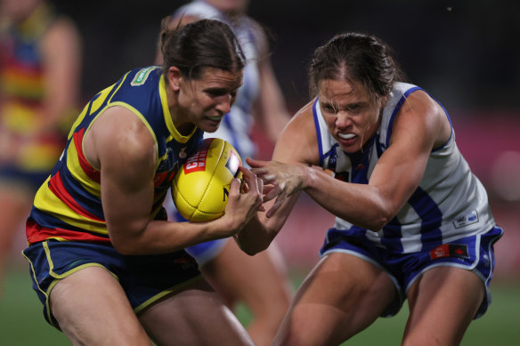 Adelaide’s Chelsea Randall and North Melbourne’s Jasmine Garner contest the ball during the AFLW qualifying final.