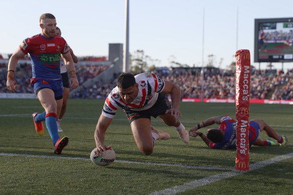 Daniel Tupou touches down against the Knights.