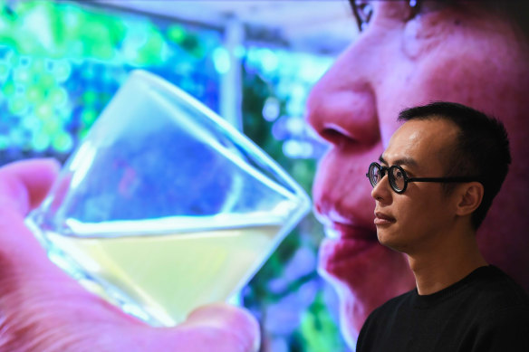 Artist James Nguyen at Montsalvat Gallery with his prize-winning digital artwork.