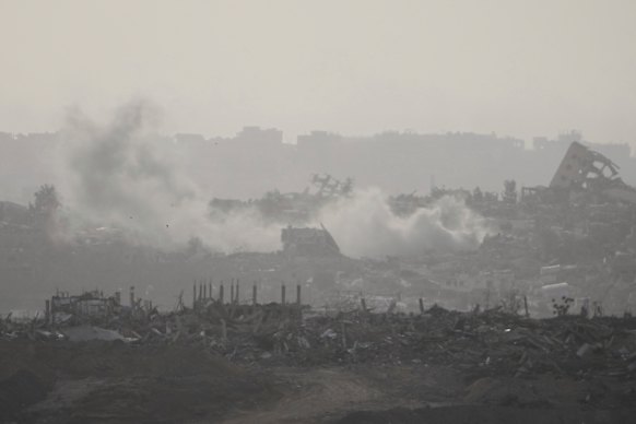 Smoke rises following an Israeli army bombardment in the Gaza Strip, seen from southern Israel, on Sunday.