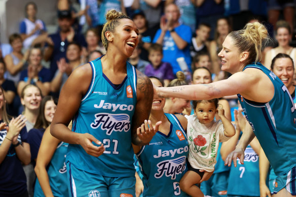 Mercedes Russell and Lauren Jackson celebrate the Southside Flyers’ win in this year’s WNBL finals.