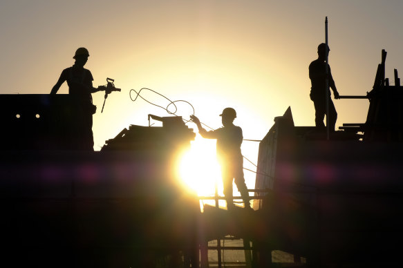 Migrant workers at a construction site in Beijing. 