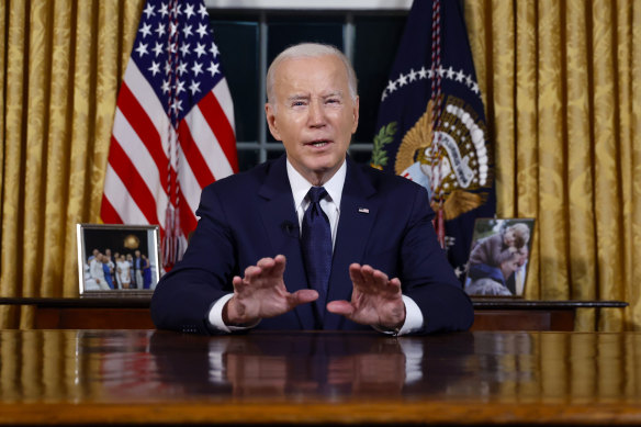 President Joe Biden speaks from the Oval Office of the White House on Friday (AEDT).